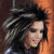 six pixelated images showing a person with long dark hair in various poses and settings, including close-ups and group shots