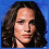 Two side-by-side pixelated images of a person with long dark hair against blue background, showing slight facial expression differences.