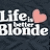 Pixelated static icon with white text 'Life is Blonde' and a pink heart symbol on dark gray background.
