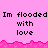 Pixelated text repeats 'Im flooded with love' across pink background, split into three above a jagged pink wave border