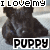Pixelated image of a dark-furred puppy with text "I LOVE MY PUPPY" above and below, featuring a pink heart symbol in the right frame.