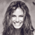 Static grayscale pixel art of a smiling person with long hair, rendered in low-resolution 256x256 pixels with dithering and anti-aliasing effects on the face and hair.