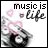 Pixelated image with 'music is life' text and abstract pink-and-gray shapes on white background.