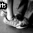 Black-and-white animation of a person's lower legs and feet in sneakers, with text changing across frames.