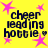 Yellow background with pink star shapes and dark blue text reading "cheer leading hottie" with a heart symbol, arranged in a pattern