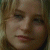 A static image of a person with light brown hair and fair skin, featuring text that changes across six from 'C' to 'Claire'