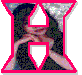 Animated sequence of a person with long dark hair in a black top, making hand gestures inside a pink-outlined shape on a gray background.