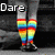 A static image of legs wearing rainbow-striped socks with text "Dare to be different" overlaid in white.