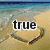 Beach scene with heart drawn in sand; text 'true' and 'love' appear above heart, then replaced by '3' symbol.