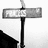 A 2x2 contact sheet of a four-frame animation featuring a street sign and pink background with text elements.
