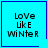 Four identical blue square display pixelated text 'LoVe uK E WiNtER' with a heart symbol in the top-right and a star symbol in the bottom-right