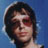 Static 48x48 pixel icon showing a person with dark hair against blue background, rendered in low-resolution pixel art style with visible dithering and color blending.