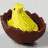 Yellow chick in brown bowl, purple flower with yellow center, pastel candy shapes, pink background text 'Peeps RULE!'