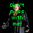 A pixelated figure in a black coat and hat with green text overlays on a black background.