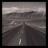 A grayscale road stretches toward distant mountains under a cloudy sky, with text changing from 'so' to 'far' to 'away' across frames.