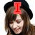 A person with brown hair and a black beret appears in four , each showing different red text above their head