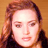 Static 48x48 pixel icon showing a close-up of a person with long brown hair against an orange background, rendered in low-resolution pixel art style.