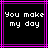Black background with white pixelated text "You make my day" framed by purple and pink lines