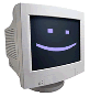Four identical CRT monitors display pixelated purple smiley faces with square eyes and curved mouths on dark screens, arranged in a against a light gray background