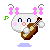 Pixelated character with white rounded head, pink cheeks, blue eyes, and brown string instrument under gray antennae with pink flowers.