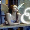 Animated icon of a winged figure leaning on a railing with glowing circular shapes and text fragments.