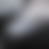 A pixelated grayscale gradient image with no distinct subjects or text, showing smooth transitions between light and dark tones across the frame.