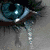 Animated sequence showing a blue eye, two silhouetted figures in a room, a heart outline, a couple embracing, and a couple kissing by water.