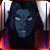 Pixelated dark blue face with closed eyes and faint smile, framed by dark hair against a multicolored border.