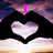 Animated icon shows hands forming a heart shape against a sunset sky, with changing text above the heart.