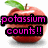 Pixelated red apple with green leaf and brown stem, overlaid by two black bars containing pink text reading 'potassium counts!!'