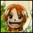Pixelated image of a character with orange hair and a wide grin, next to text reading "AnimeIM" and "com" on a black background.