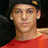 six distinct images showing a person in various poses and color treatments, including red shirt, black cap with yellow emblem, back view on orange background, and grayscale close-up