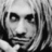 A 48x48 pixel buddy icon split into two sections: a grayscale portrait of a person with long hair on the left and green text reading "Original Icons .com" on a dark green background on the right.