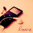 A pixelated image shows a dark-colored shoe with a light sole on a beige background, with partial text reading "Lover" below.