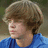 Pixelated image of a person with light brown hair wearing a blue shirt, next to dark blue text reading "Isnt he Dreamy" on a white background.