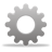 Pixelated grayscale gear icon with six teeth, centered on light gray background, casting subtle shadow below.