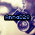 Pixelated image with blue text 'Anno028' on black rectangle over abstract purple and beige background.