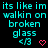Pixelated cyan text on black background reads 'its like im walkin on broken glass' with two identical symbols below, one pink heart and one cyan symbol.