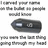 Pixelated black-and-white image with text fragments and a central dark oval shape resembling a device, surrounded by distorted lettering.