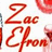 Red cursive text 'Zac Efron' on white background with partial red circular shapes visible at edges.