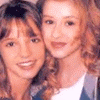 repeated images showing two smiling people with light brown hair, wearing white shirts and blue jackets, overlaid with text reading "We Used to Be Friends" in pink