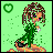 Pixelated green background with heart symbol, brown-haired figure in green dress holding white object, changing pose and text elements across frames.