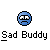 Blue pixelated circular face with downturned mouth and wide eyes, positioned above black-and-white pixel text reading "Sad Buddy" on gray background.