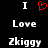 Static pixel art displays 'I' flanking a red heart symbol above 'Love' and 'Zkiggy' in white text on black background.