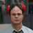 A pixelated image shows a person with red devil horns, wearing glasses and a light shirt with dark tie, next to bold red text reading "Dwight is the world's hero.".