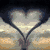 A heart-shaped frame formed by two hands over a sunset sky with clouds, transitioning to stars on a golden background.