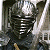 A 50x50 pixel animated buddy icon featuring a metallic armored figure on the left and green text reading "Original Icons .com" on the right, displayed as a contact sheet with two frames.