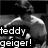 Black-and-white pixelated animation of a person in motion with text overlays reading 'teddy geiger!' and 'super hot!' on separate frames.