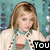 six pixelated shows a person with light brown hair and blue eyes wearing a white jacket over a red top, against a teal background with repeating patterns