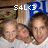 Three pixelated faces in a horizontal row with white text 'S4L<3' overlaid on a brown and blue background.